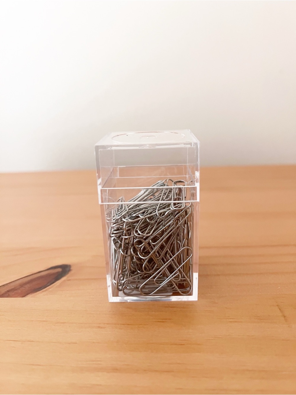 Paper clips in holder